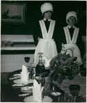 Parlourmaid and Under-Parlourmaid Ready to Serve Dinner