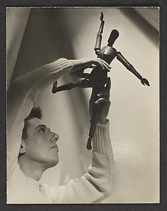 [Paul Cadmus with Wooden Figure]