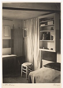 [A Corner of Mondrian's Studio with Bed, Stool, Curtain, and Mirrors]