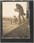 [Alfred Stieglitz Photographing on a Bridge]
