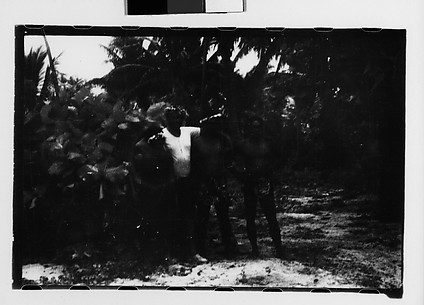 [South Seas: Unidentified Group on Shore]