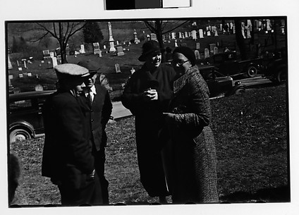 [Two Women and Two Men Having Conversations at Outdoor Country Auction]