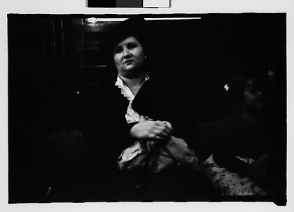 [Subway Passengers, New York City: Woman with Little Girl]