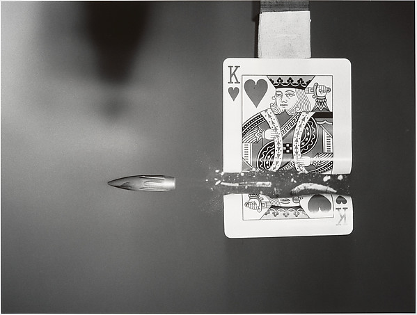 [Bullet Cutting Through Playing Card]