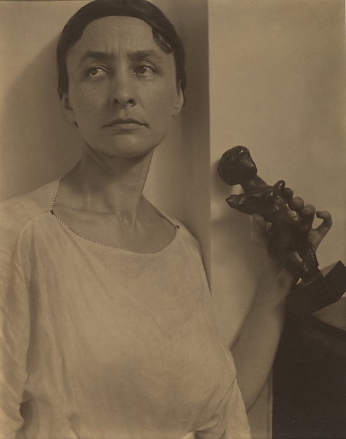Georgia O'Keeffe with Matisse Sculpture