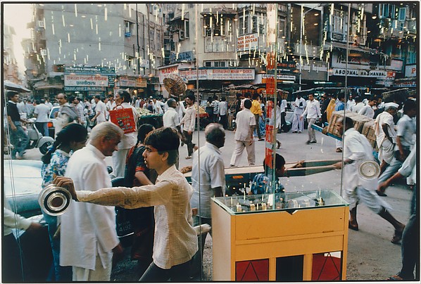 Bazaar Through Glass Door, Bombay