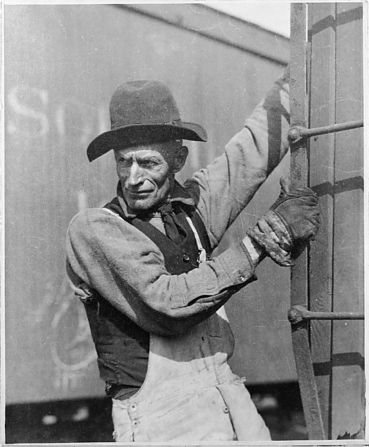 [Man and Freight Train]