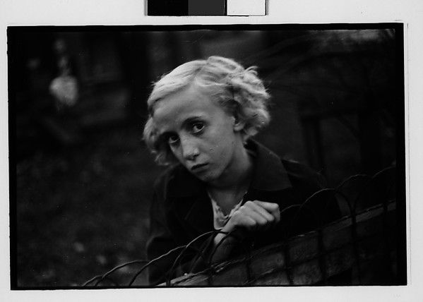 [Girl Leaning on Wire Fence in Yard, Vicinity Bethlehem, Pennsylvania]