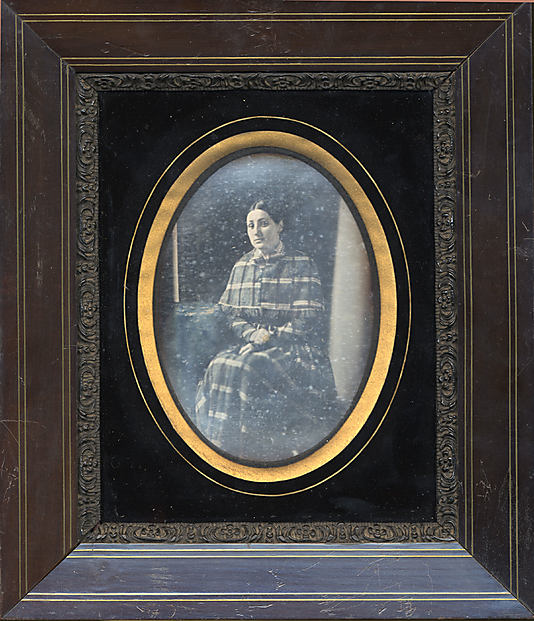 [Seated Woman]