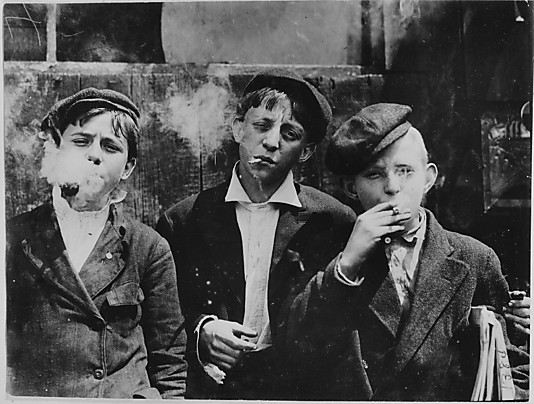 11:00 A.M. Monday, May 9th, 1910. Newsies at Skeeter's Branch, Jefferson near Franklin. They were all smoking. Location: St. Louis, Missouri.