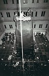 [William Mahin, Lette Eisenhauer, and Charles Simon Atop Giant "Mountain" Construction in "The Courtyard," A Happening by Allan Kaprow, New York City]