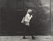 [Street Scene: Woman Wearing Straw Hat and Black Stockings, New York City]
