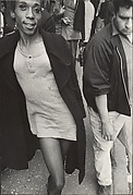 [Street Scene: Young Woman in Dress and Overcoat, New York City]