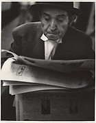 [Man Reading Yiddish Newspaper]