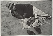 [Beach Scene: Woman Wearing Striped Hat and Dark Jacket, Coney Island, New York]