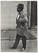 [Street Scene: Man in Bowler Hat and Overcoat, New York City]