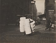 Boy carrying hats. Blee[c]ker St., N.Y.