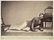 [Man in Chainmail Tunic Posing as a Dying Soldier]