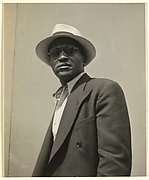 [Male Pedestrian in Dark Jacket with Panama Hat, Detroit (for Fortune Magazine Article "Labor Anonymous")]