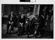 [Men Seated on Bench Outside Tobacconist Shop, New York City]