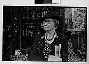 [Old Woman Outside Main Street Grocery Store, Ossining, New York]