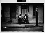 [Men in French Quarter Doorway, New Orleans, Louisiana]