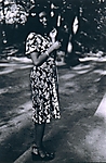 [Young Woman in Flowered Dress]
