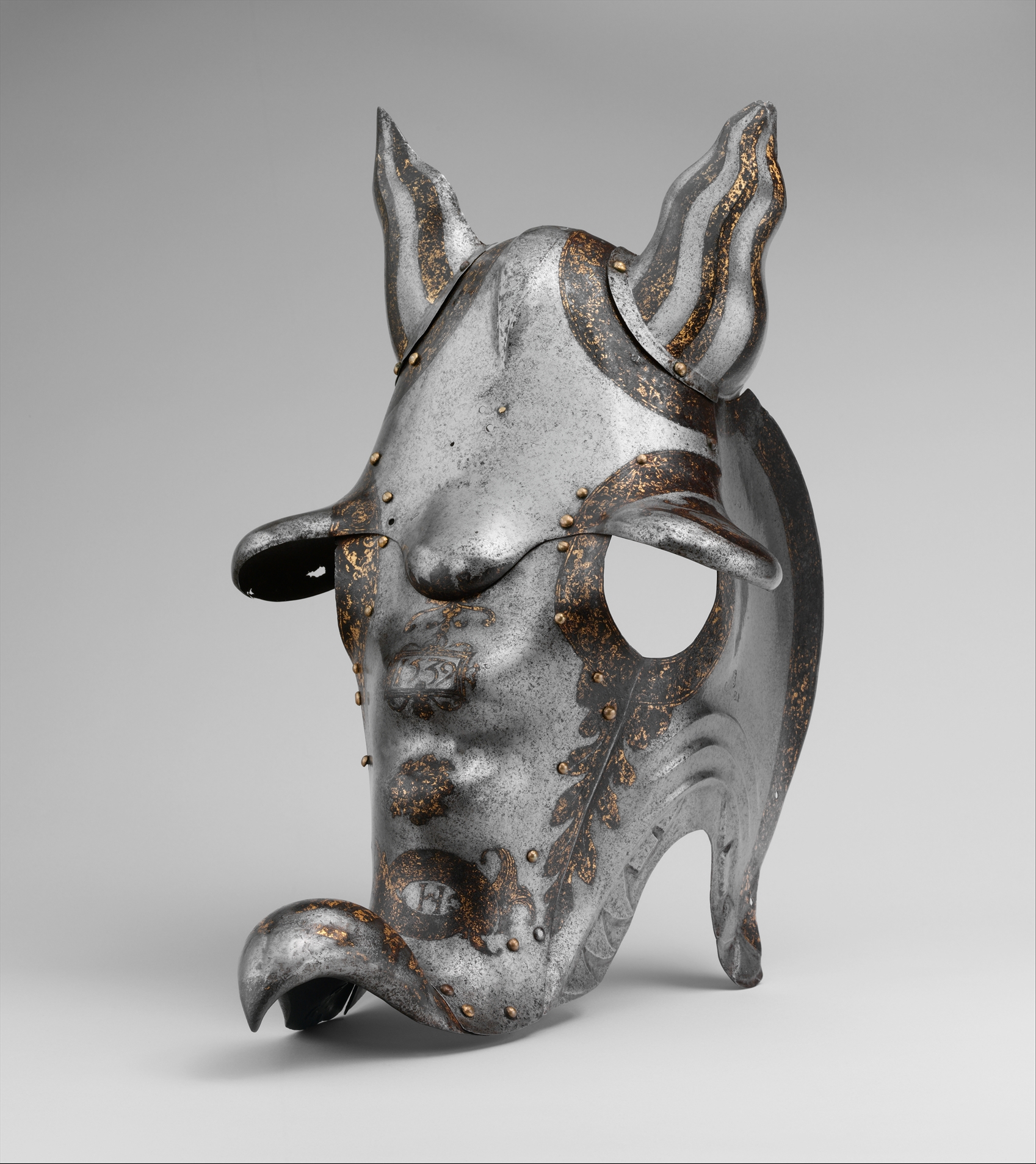 Demi-Chanfron, c. 1550. The chanfron, head defense for a horse, was  introduced in the 1300s. It included two side pieces to protect the cheeks.  In the 16th and 17th centuries, when armor