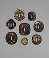 Sword Guard (<i>Tsuba</i>) Depicting Biting Lion Heads (<i>Shikami</i>) and Arabesques (獅噛唐草図南蛮鐔), Iron, gold, copper-gold alloy (<i>shakudō</i>), Japanese