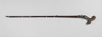 Flintlock Gun, Iron, wood (likely mahogany), silver, brass, ivory, Sri Lankan
