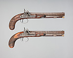 Pair of Pellet-Lock Pistols with Case with Accessories, Charles Moore (British, active in London and Paris, recorded ca. 1821–45), pistols: steel, wood (walnut), platinum, brass; case: wood (mahogany), textile, brass, bone, paper; powder flask: brass; bullet mold: steel; nipple wrench: wood (mahogany?), brass, steel; ramrod: wood (mahogany?), bronze, steel; spare nipples: steel; spare firing pins: steel, British, London