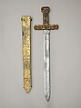 Costume Armor and Sword in the Classical Style, Helmet includes original paper label of Hallé (French, Paris, active ca. 1780–1800), Linen, papier-mâché, bole, gold leaf, graphite (helmet); silk, cotton, metal coils and spangles, metallic yarn (tunic); steel, wood, gesso, silver, gold leaf (sword), French, Paris