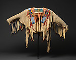 War shirt, Tanned leather, glass beads, pigment, wool cloth, ermine, human hair, and feathers, Crow, Native American