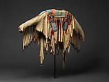 War shirt, Tanned leather, glass beads, pigment, wool cloth, ermine, human hair, and feathers, Crow, Native American