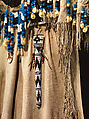 Dress and belt with awl case, Dress: tanned leather, glass beads, shell, bone, elk teeth, and brass thimbles
belt: commercial leather, glass beads, and metal studs
awl case: tanned leather, and glass beads, Wasco, Native American