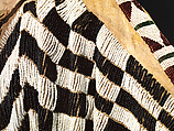 Dress and belt with awl case, Dress: tanned leather, glass beads, shell, bone, elk teeth, and brass thimbles
belt: commercial leather, glass beads, and metal studs
awl case: tanned leather, and glass beads, Wasco, Native American