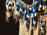 Dress and belt with awl case, Dress: tanned leather, glass beads, shell, bone, elk teeth, and brass thimbles
belt: commercial leather, glass beads, and metal studs
awl case: tanned leather, and glass beads, Wasco, Native American