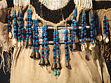 Dress and belt with awl case, Dress: tanned leather, glass beads, shell, bone, elk teeth, and brass thimbles
belt: commercial leather, glass beads, and metal studs
awl case: tanned leather, and glass beads, Wasco, Native American