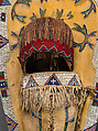 Cradleboard, Wood, tanned leather, pigment, glass beads, wool cloth, metal cones, feathers, and bone, Ute, Native American