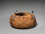 Intermittently feathered three-rod coiled basket, Willow shoot foundation, sedge root weft, dyed bulrush root weft, feathers (acorn woodpecker, California valley quail topknots, clipped black feathers of an unknown species), clamshell disk beads, glass beads, and string, Pomo (Northern California)