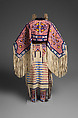 Woman’s Dress and Accessories, Jodi Archambault (American, Hunkpapa Lakota/Teton Sioux, born North Dakota, 1969), Tanned and commercial leather, glass and metal beads, cotton, silk, dentalium shell, metal cones, horsehair, plastic, brass bells, porcupine quills, coins, Hunkpapa Lakota (Teton Sioux)