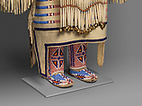 Woman’s Dress and Accessories, Jodi Archambault (American, Hunkpapa Lakota/Teton Sioux, born North Dakota, 1969), Tanned and commercial leather, glass and metal beads, cotton, silk, dentalium shell, metal cones, horsehair, plastic, brass bells, porcupine quills, coins, Hunkpapa Lakota (Teton Sioux)