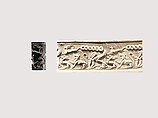 Cylinder seal and modern impression: animal combat and sphinx, Hematite