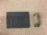 Cylinder seal with hunting scene, Beige fossiliferous Limestone, stained green at ends, Assyrian