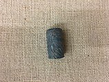 Cylinder seal with animals, Egyptian Blue, Assyrian