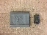 Cylinder seal with animal and divine symbols, Egyptian Blue, Assyrian
