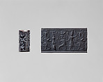 Cylinder seal and modern impression: hunter spearing a lion before deity with staff, Black hematite