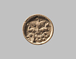 Stamp seal with a knob handle: bird of prey with two horned animals caught in its talons, Black steatite, Old Assyrian Trading Colony