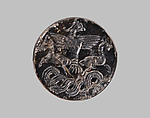 Stamp seal with a knob handle: bird of prey with two horned animals caught in its talons, Black steatite, Old Assyrian Trading Colony