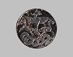 Stamp seal with a knob handle: bird of prey with two horned animals caught in its talons, Black steatite, Old Assyrian Trading Colony